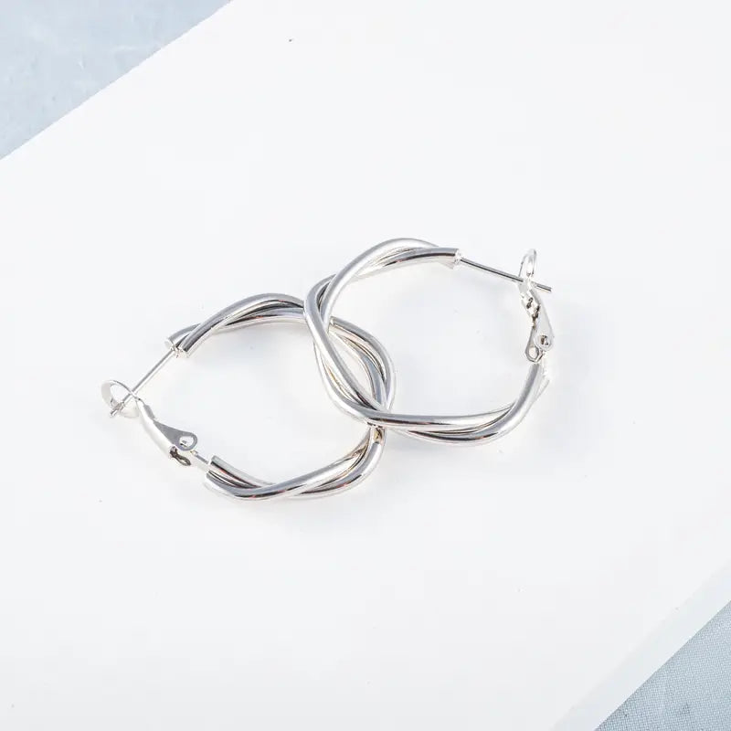 SteelCharm | Elegant Curved Hoop Earrings 